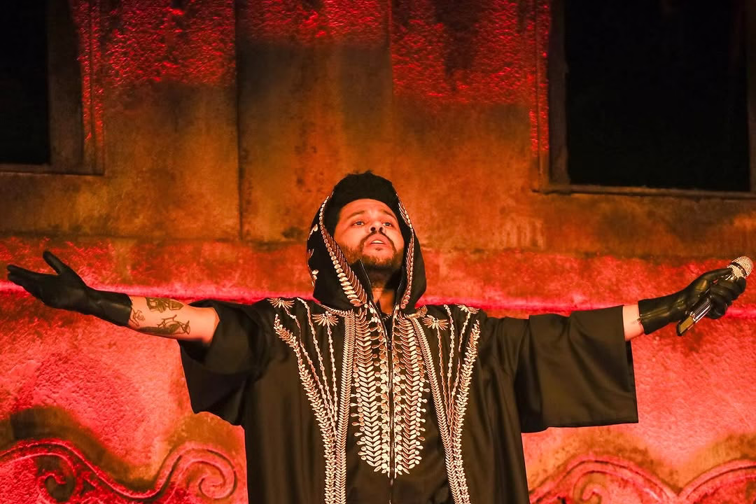 The Weeknd performing live at Northwest Stadium, Landover, on August 2, 2025, alongside Playboi Carti and Mike Dean.